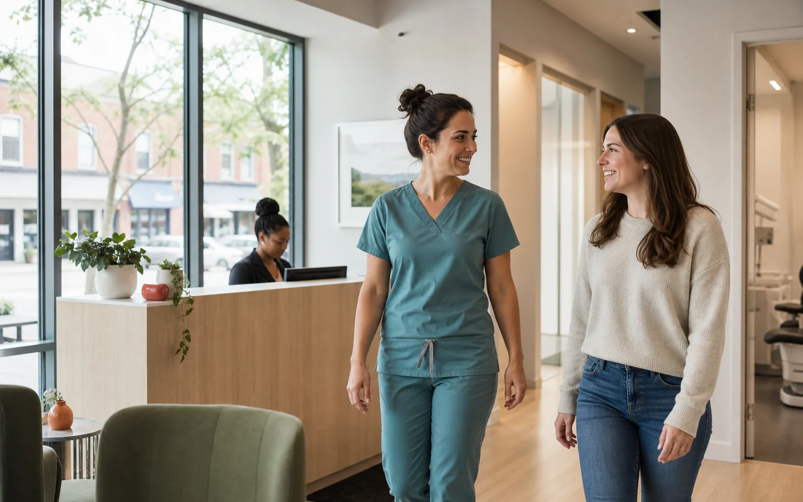 Dentist walking with a patient through a modern dental clinic