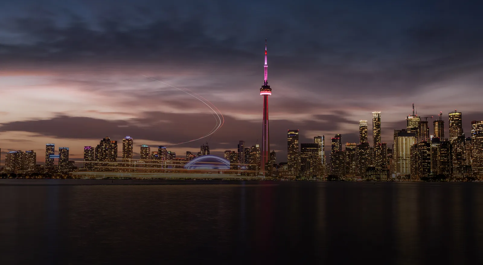 Toronto skyline at dusk with the CN Tower, from the CSLS website homepage