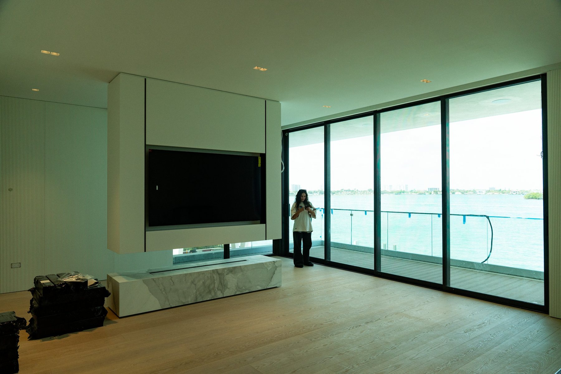 Contemporary Miami interior opening toward the water